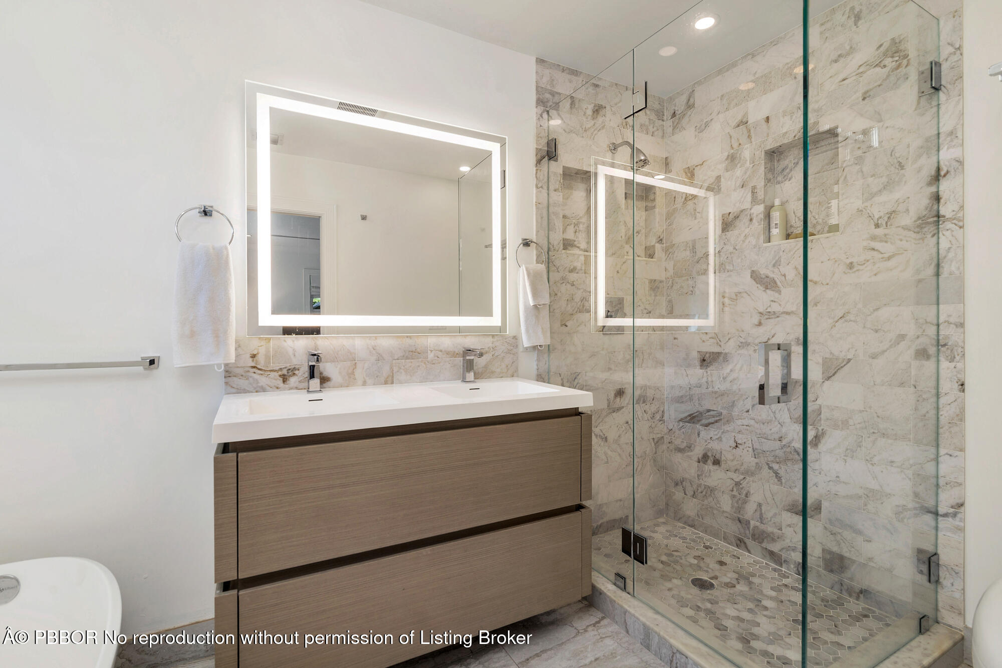 265 Rilyn Drive West Palm Beach, FL 33405 - Photo 11 of 23 a bathroom with a shower sink and mirror