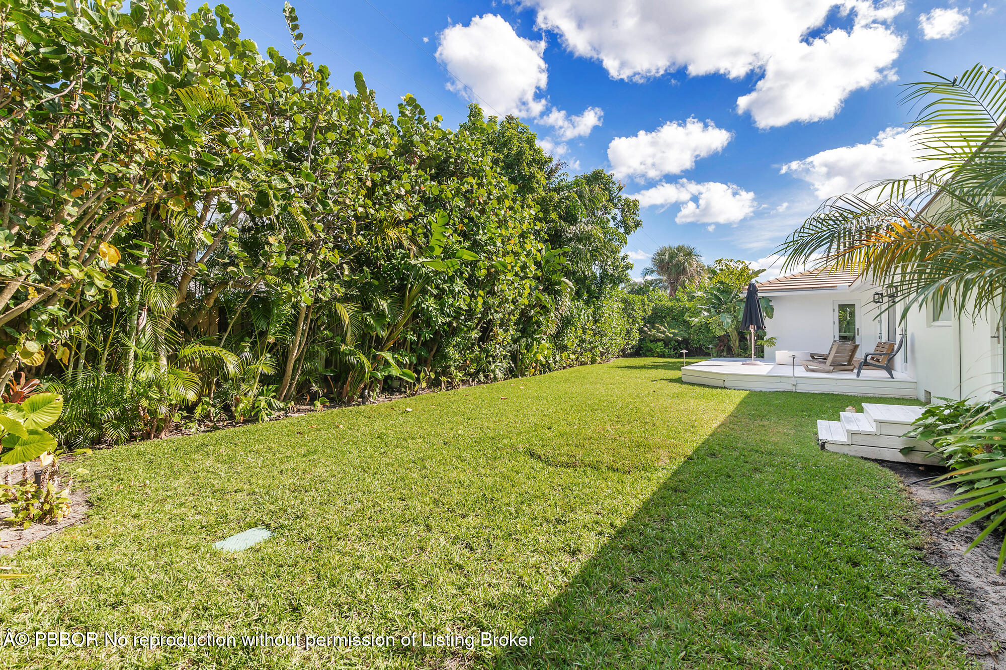 265 Rilyn Drive West Palm Beach, FL 33405 - Photo 20 of 23 a view of a yard with swimming pool