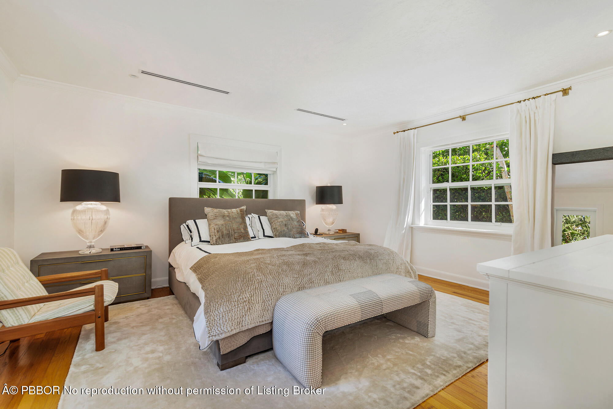 265 Rilyn Drive West Palm Beach, FL 33405 - Photo 10 of 23 a bedroom with a bed flat screen tv and window