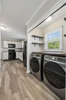 a view of kitchen and sink
