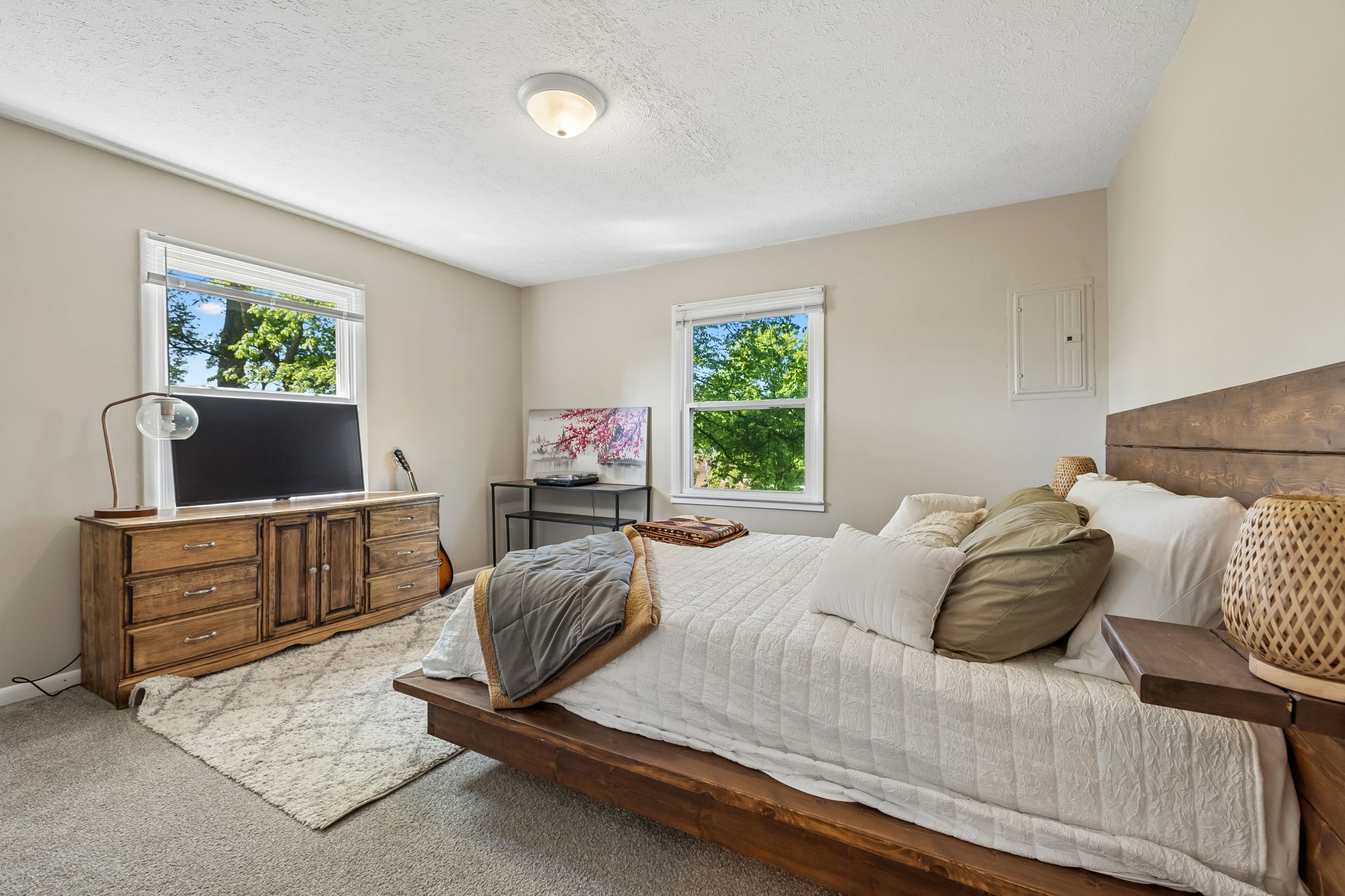 153 Old Lebanon Road Carthage, TN 37030 - Photo 15 of 29 a bedroom with a bed and flat screen tv