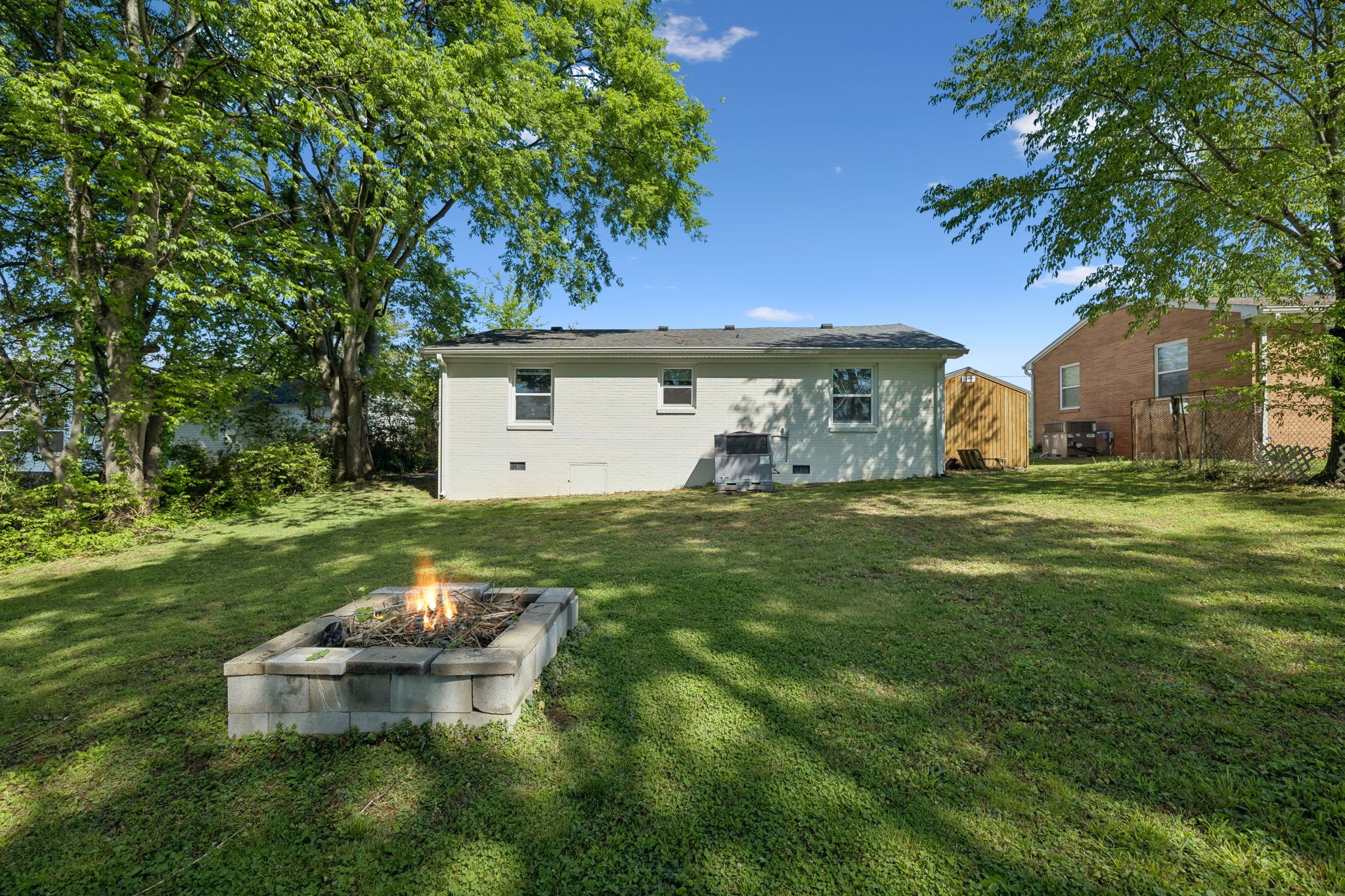 153 Old Lebanon Road Carthage, TN 37030 - Photo 24 of 29 a view of a backyard with a garden and tree