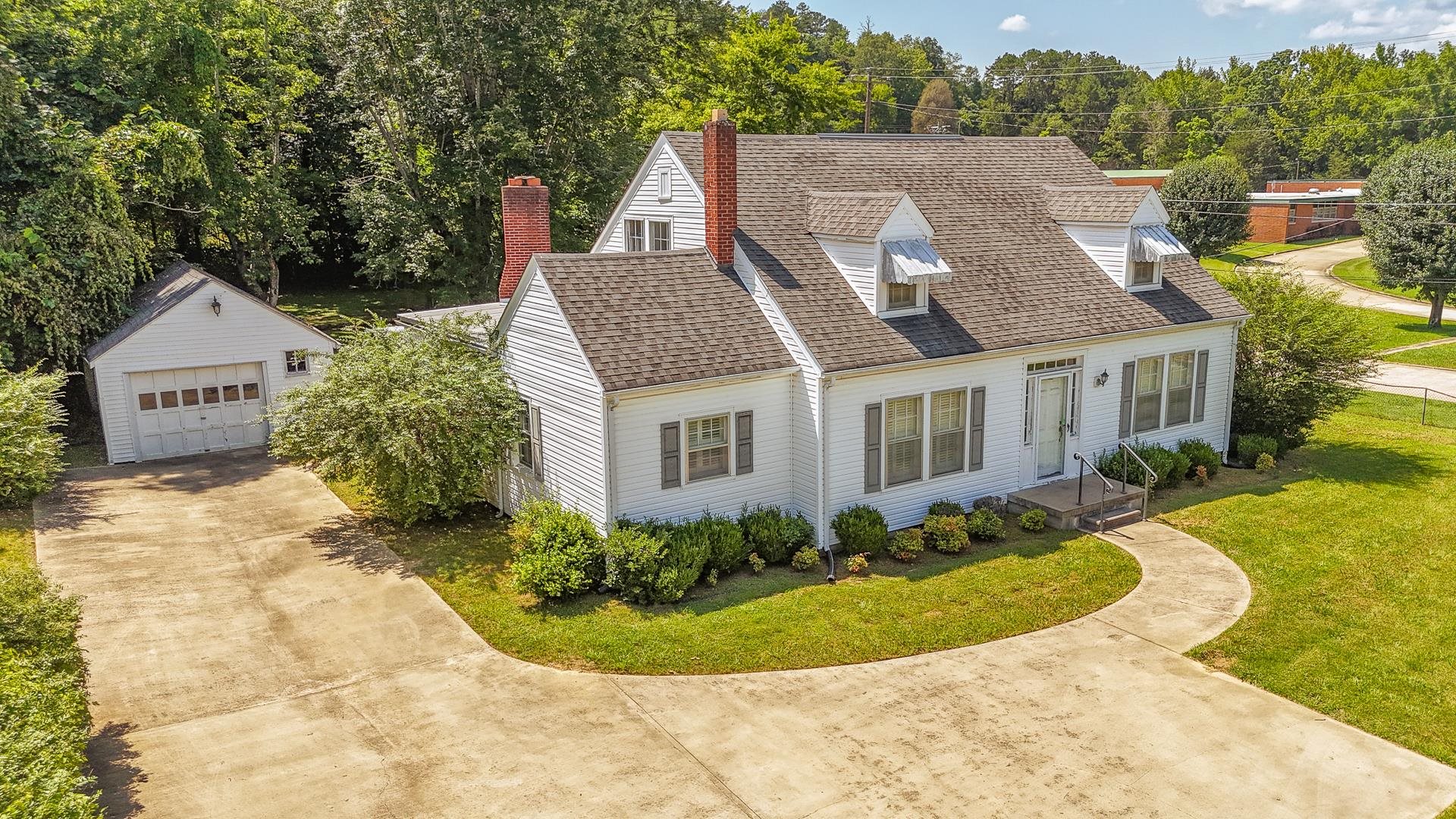 a view of a house with a garden