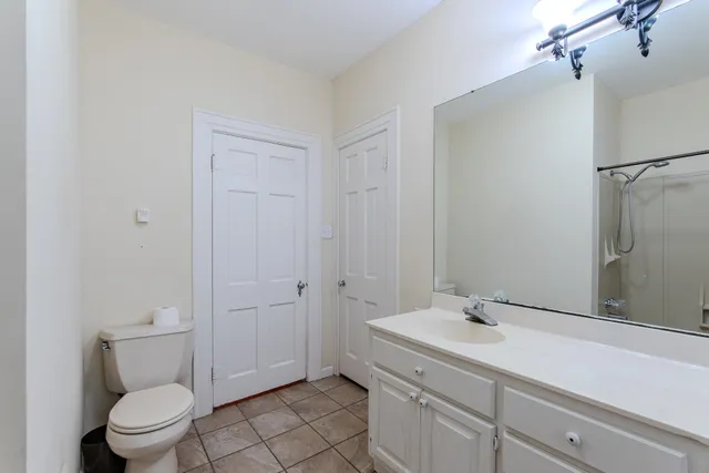 a view of a room with window and wooden floor