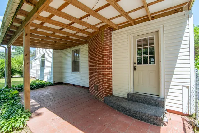 a view of a trees with a yard