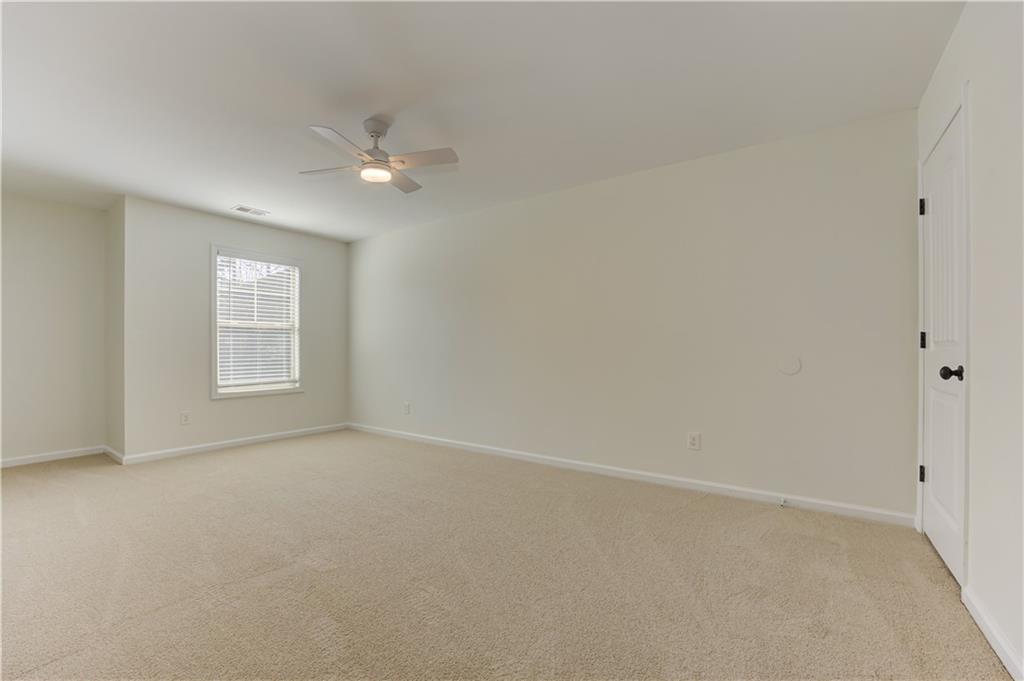 605 Summit Point Canton, GA 30114 - Photo 43 of 56 a view of an empty room with a window