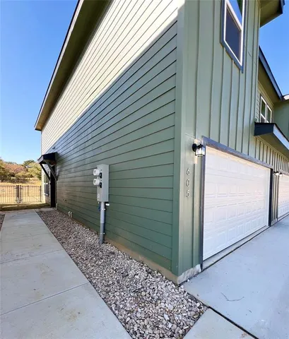 a view of a back yard of the house