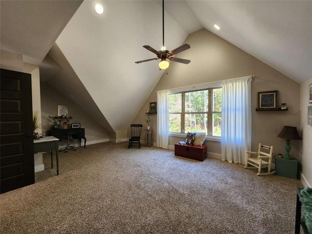 7350 Banks Mill Road Douglasville, GA 30135 - Photo 19 of 27 a living room with furniture and a window