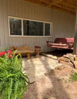 a view of a backyard of the house