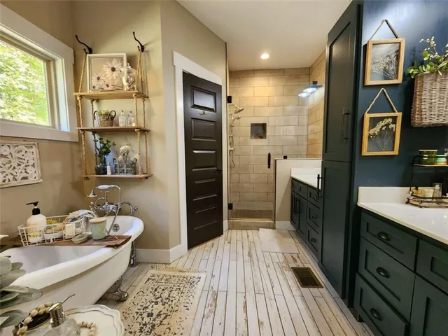 a bathroom with a double vanity sink and a mirror
