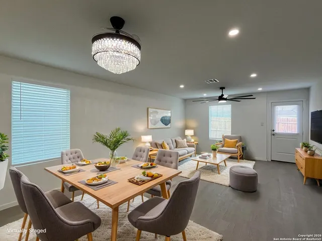 a view of a dining room with furniture