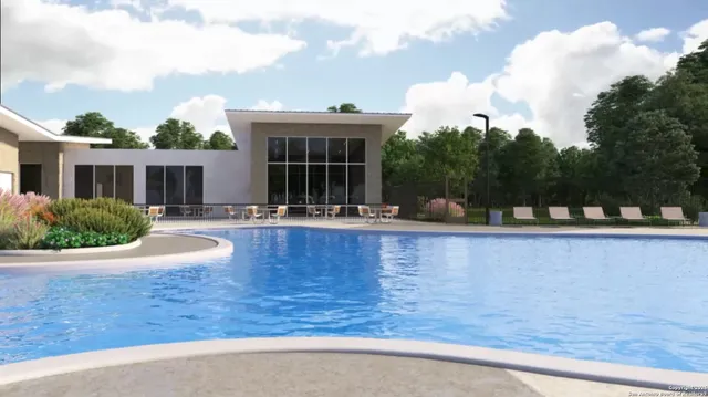 a view of swimming pool with outdoor seating