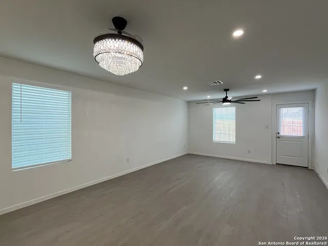 an empty room with window