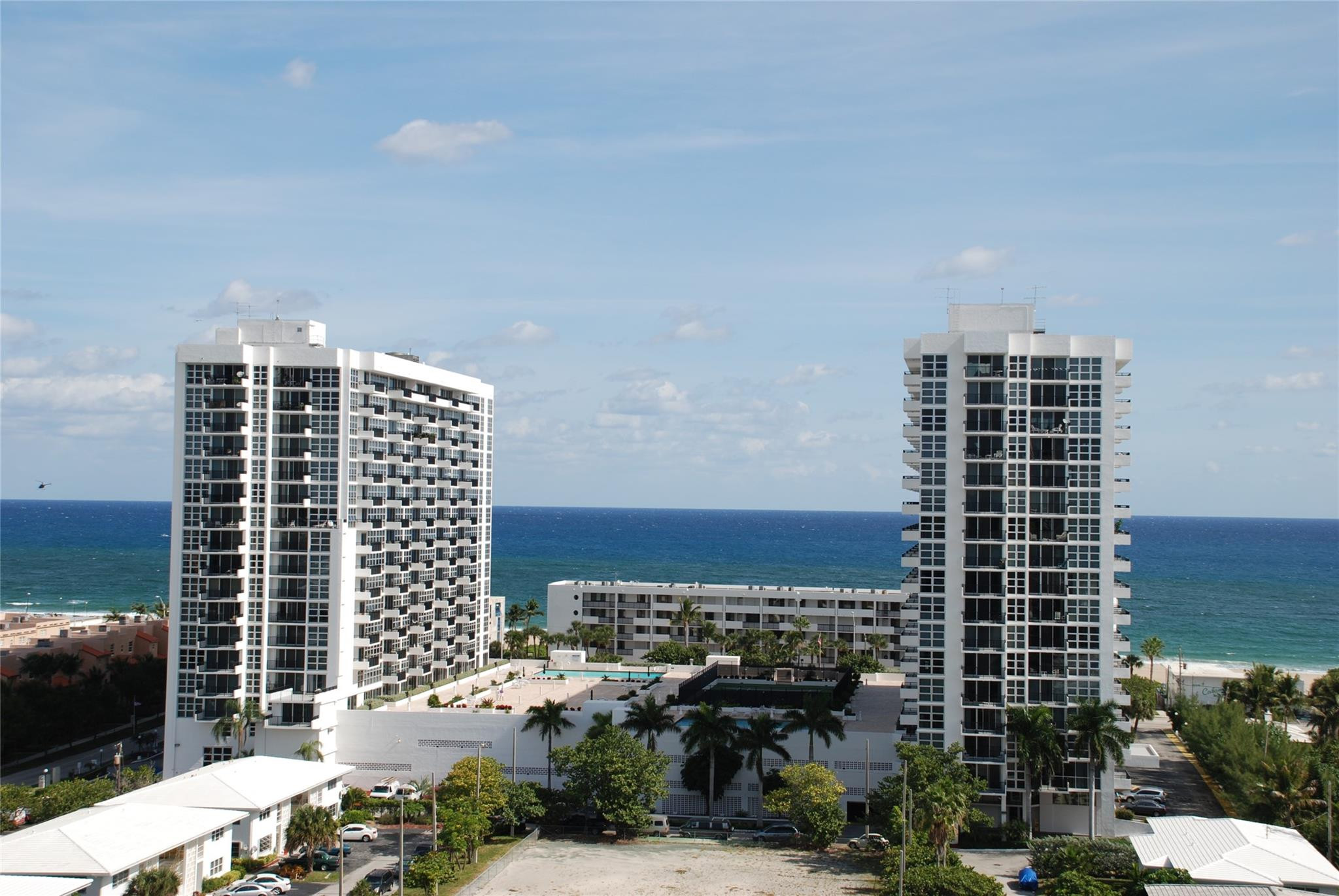 525 North Ocean Boulevard, Unit 522 Pompano Beach, FL 33062 - Photo 1 of 34 a city view with tall buildings