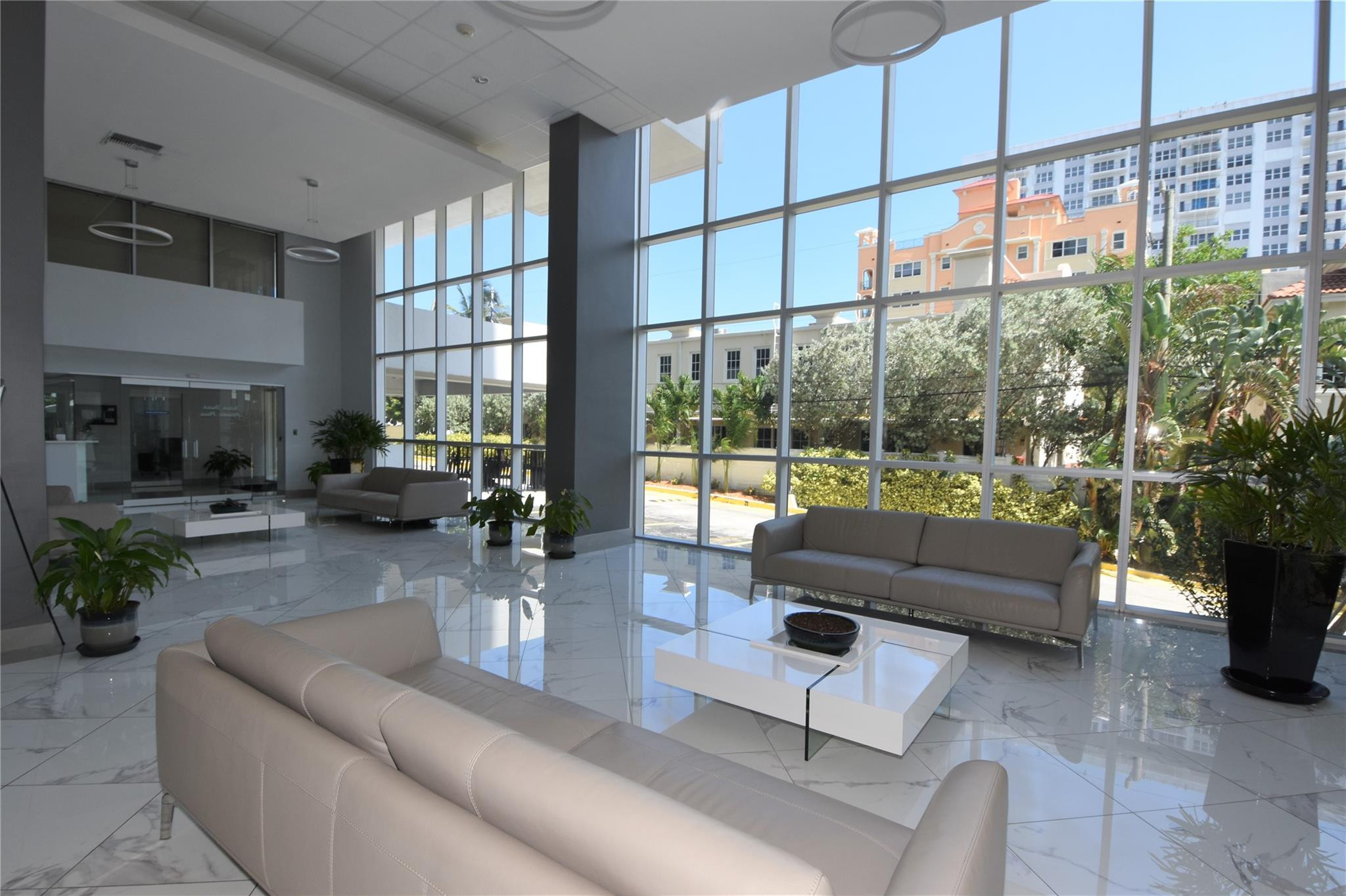 525 North Ocean Boulevard, Unit 522 Pompano Beach, FL 33062 - Photo 3 of 34 a living room with furniture and a large window