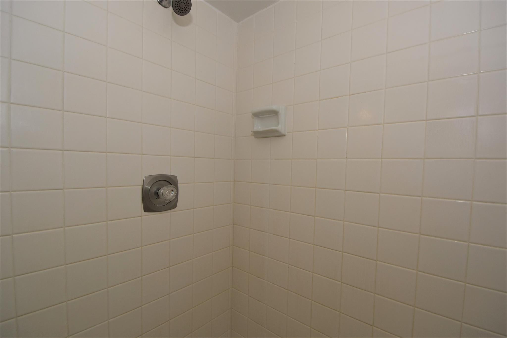 525 North Ocean Boulevard, Unit 522 Pompano Beach, FL 33062 - Photo 31 of 34 a bathroom with a shower