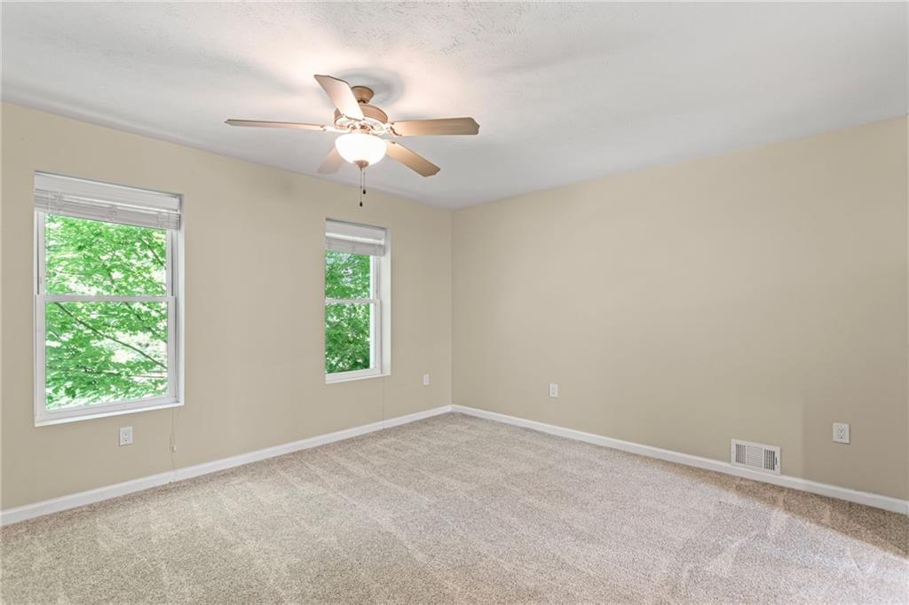 2815 Jane Street Pittsburgh, PA 15203 - Photo 17 of 42 an empty room with a window and a fan