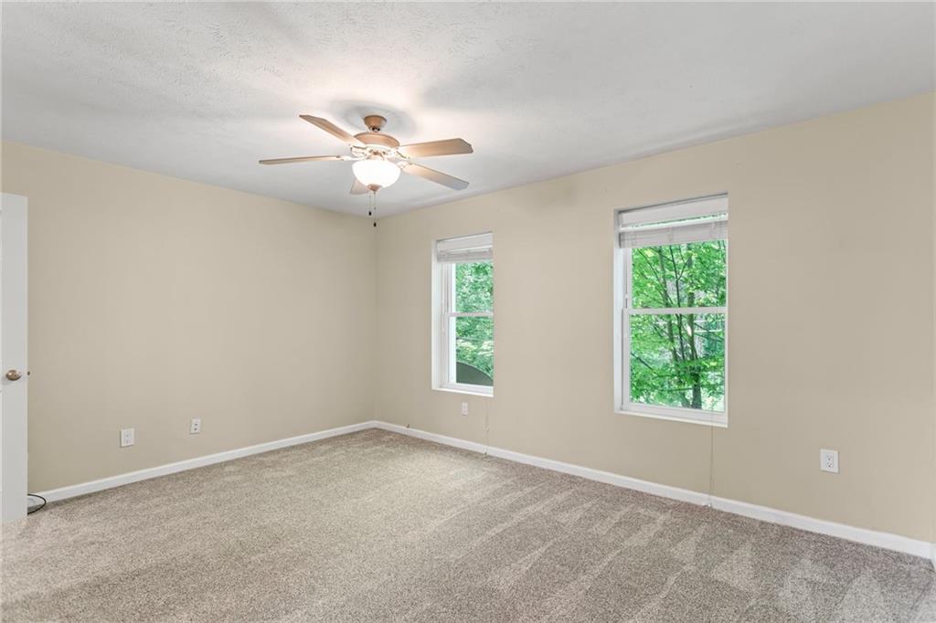 2815 Jane Street Pittsburgh, PA 15203 - Photo 18 of 42 an empty room with windows and fan
