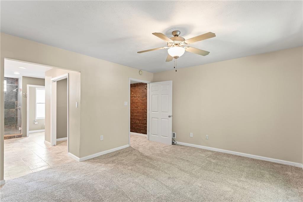2815 Jane Street Pittsburgh, PA 15203 - Photo 19 of 42 an empty room with closet and fan