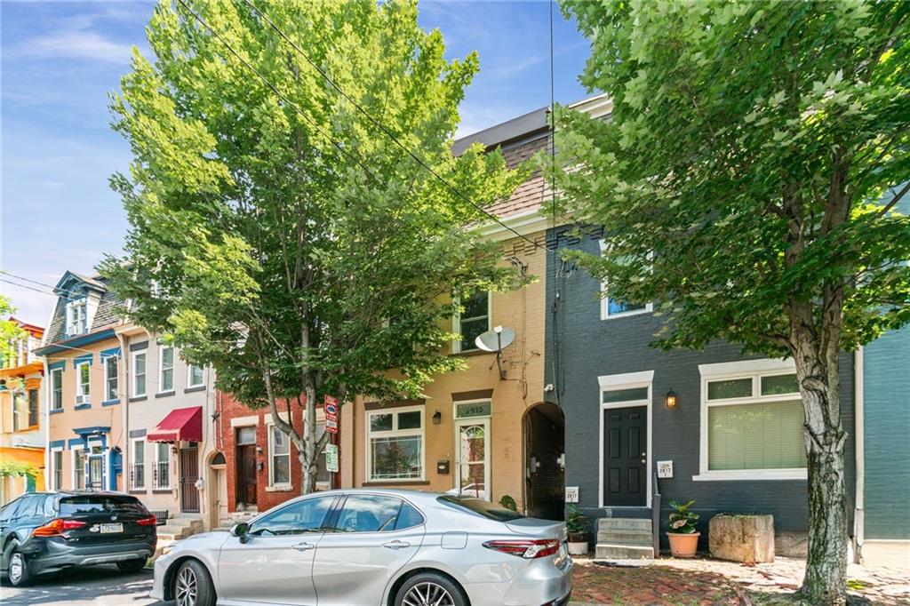 2815 Jane Street Pittsburgh, PA 15203 - Photo 2 of 42 a view of a cars park in front of a building