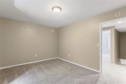 an empty room with a workbench