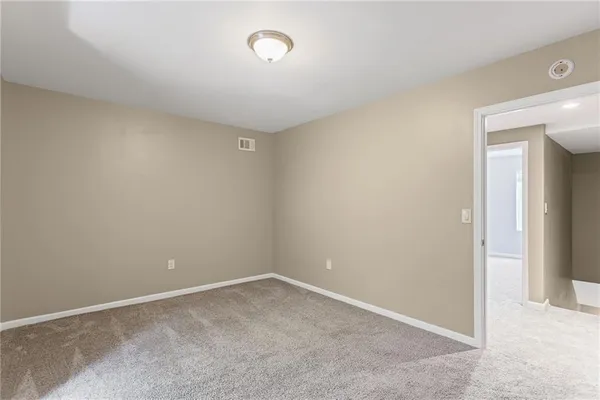 an empty room with a workbench