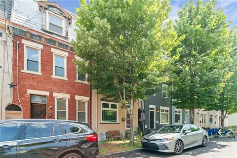 a car parked in front of a building