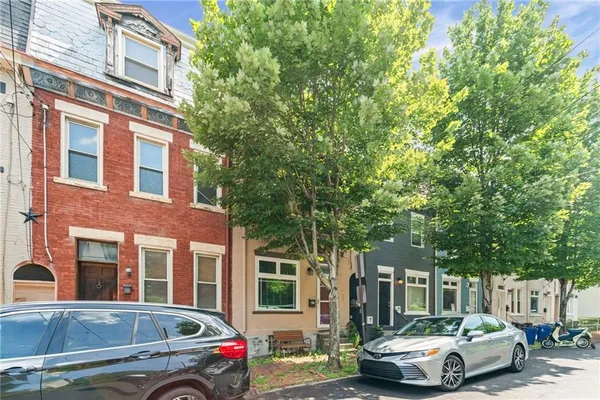 a car parked in front of a building