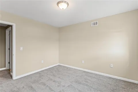 an empty room with a workbench