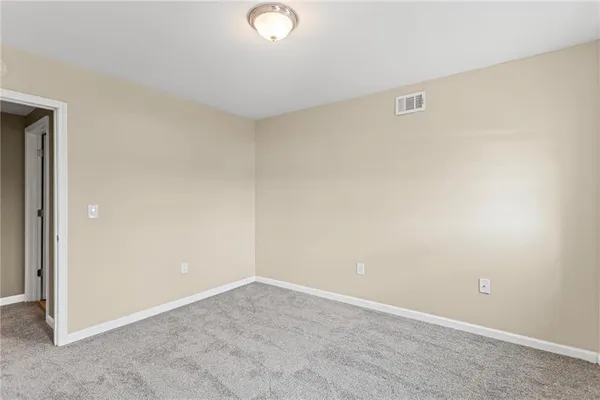 an empty room with a workbench