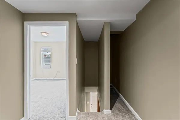 a view of hallway with stairs