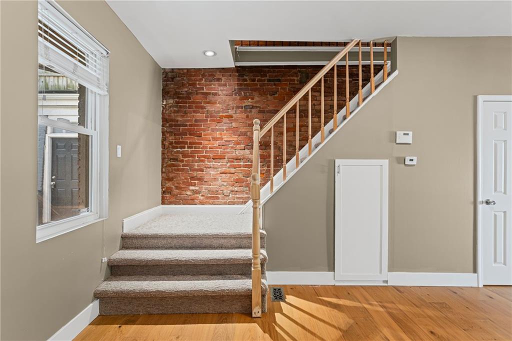 2815 Jane Street Pittsburgh, PA 15203 - Photo 10 of 42 a view of entryway and hall with wooden floor