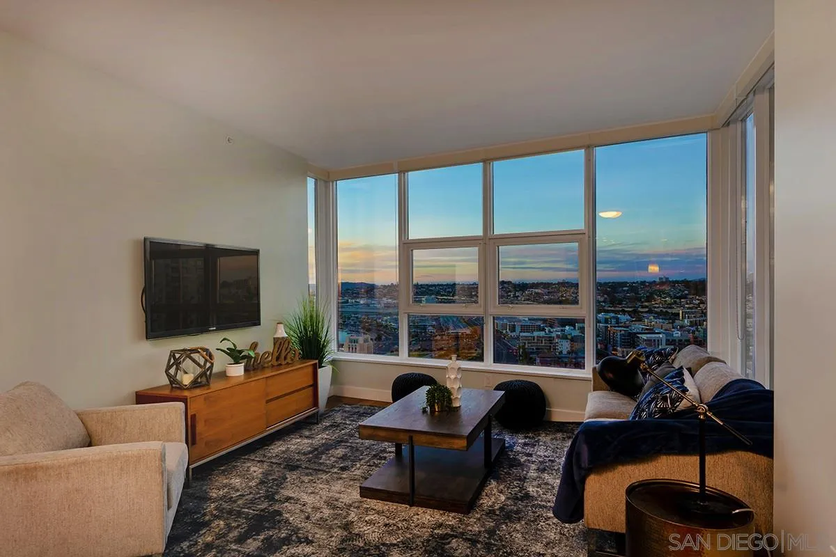 1325 Pacific Highway, Unit 2705 San Diego, CA 92101 - Photo 13 of 59 a living room with furniture and a flat screen tv