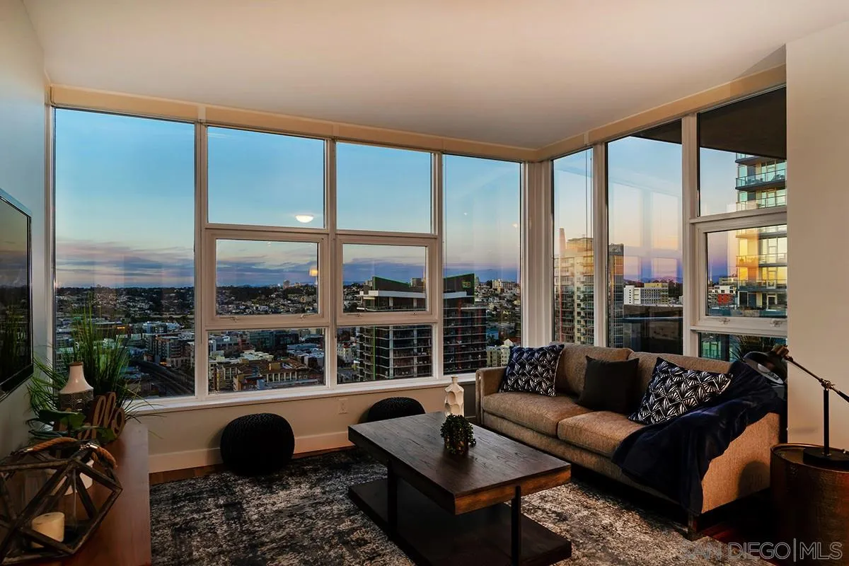 1325 Pacific Highway, Unit 2705 San Diego, CA 92101 - Photo 16 of 59 a living room with furniture and a floor to ceiling window