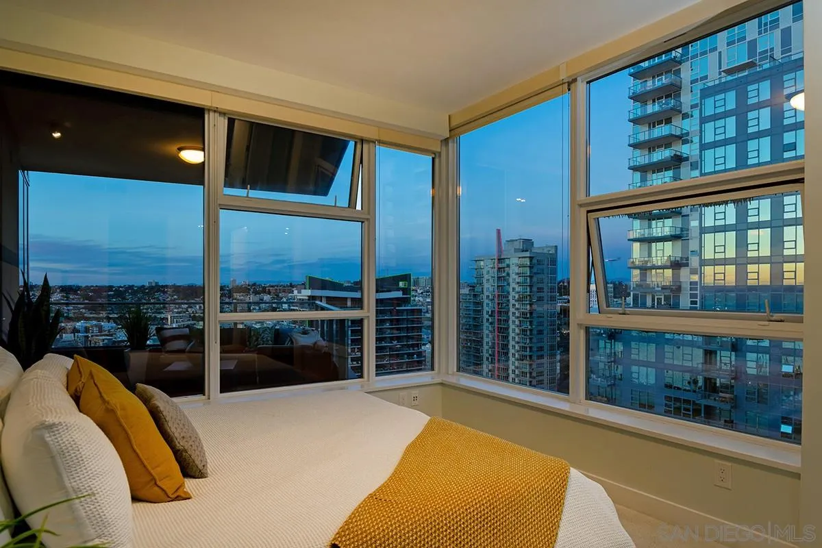 1325 Pacific Highway, Unit 2705 San Diego, CA 92101 - Photo 24 of 59 a bedroom with a bed and a night stand