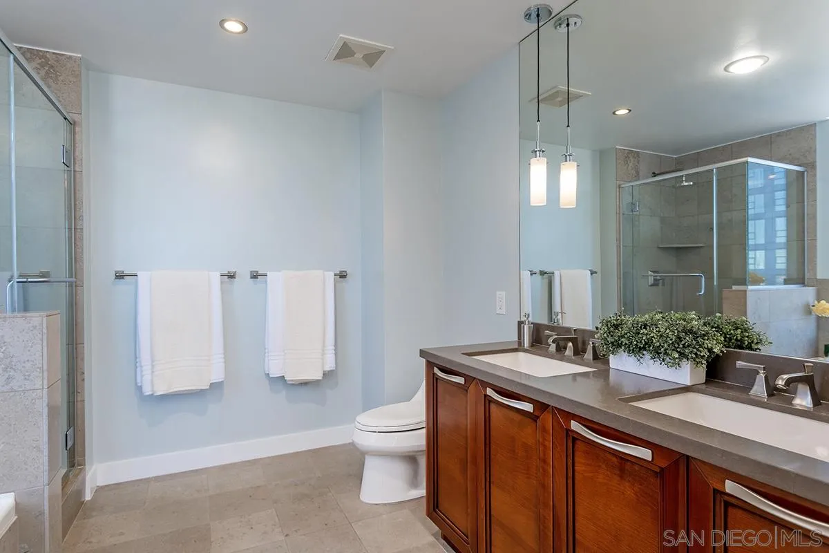 1325 Pacific Highway, Unit 2705 San Diego, CA 92101 - Photo 32 of 59 a spacious bathroom with a sink double vanity and a toilet