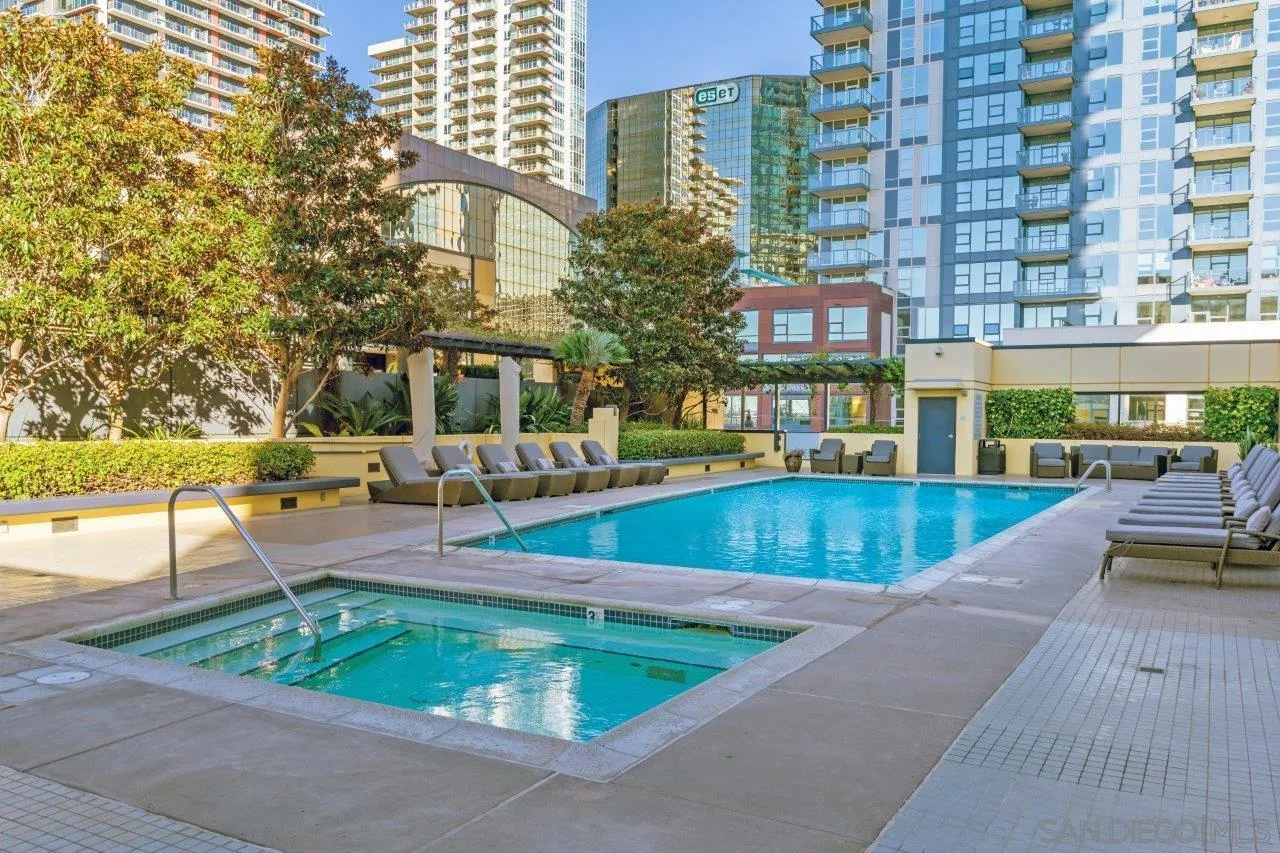 1325 Pacific Highway, Unit 2705 San Diego, CA 92101 - Photo 44 of 59 a view of a swimming pool with a patio