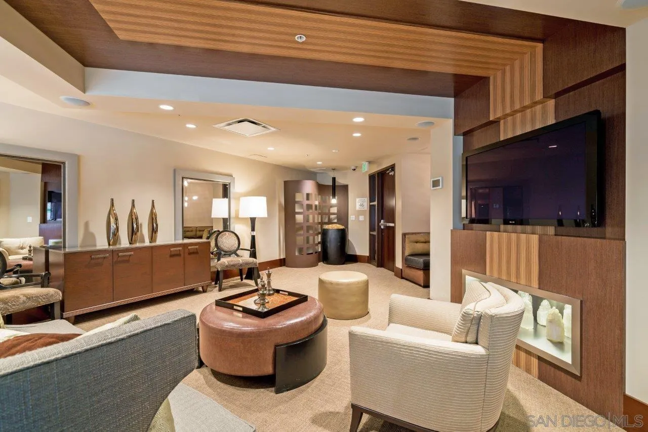 1325 Pacific Highway, Unit 2705 San Diego, CA 92101 - Photo 47 of 59 a living room with furniture and a flat screen tv