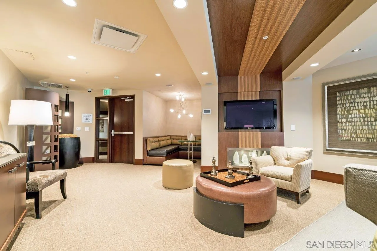 1325 Pacific Highway, Unit 2705 San Diego, CA 92101 - Photo 49 of 59 a living room with furniture and kitchen view