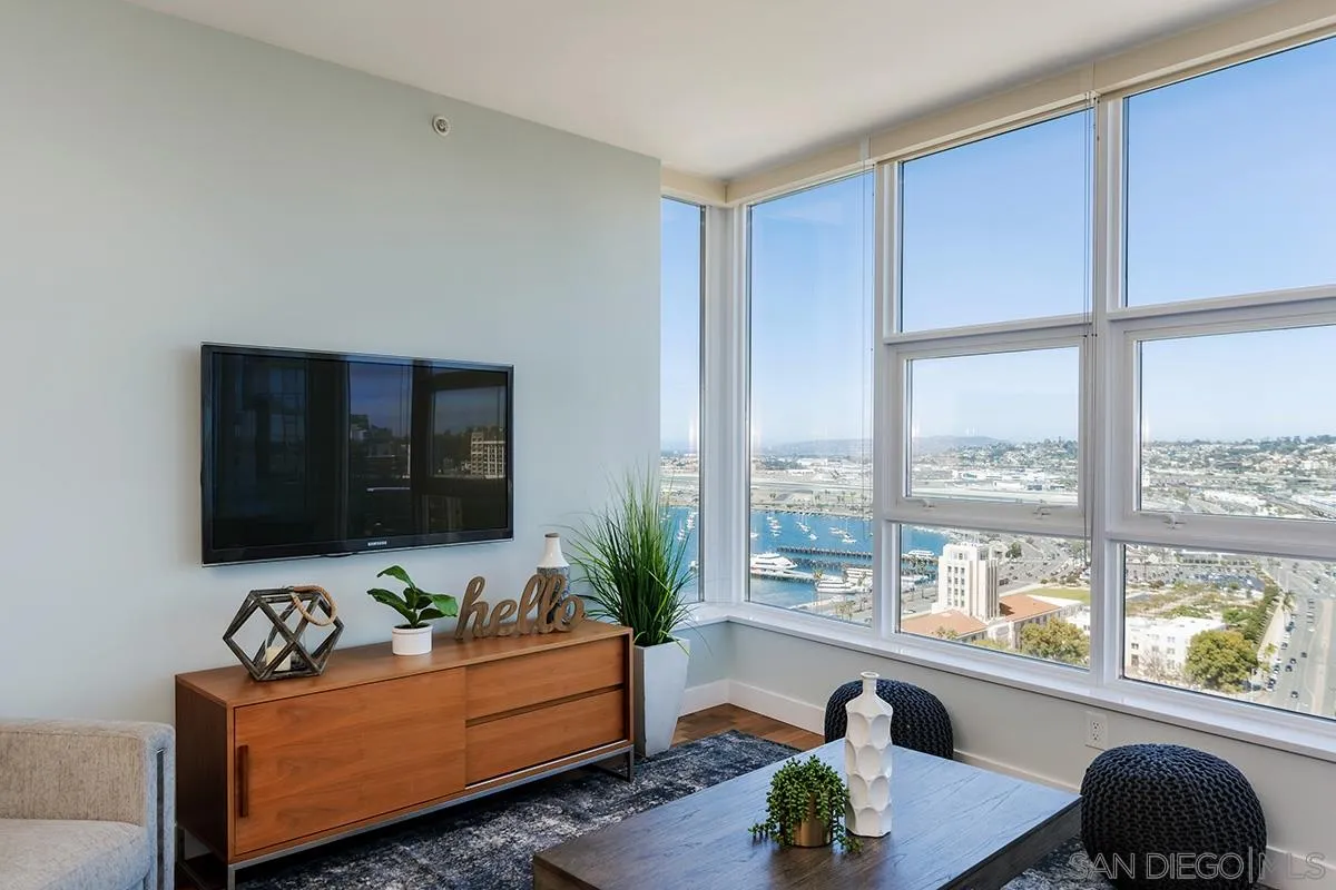 1325 Pacific Highway, Unit 2705 San Diego, CA 92101 - Photo 6 of 59 a living room with furniture and a potted plant