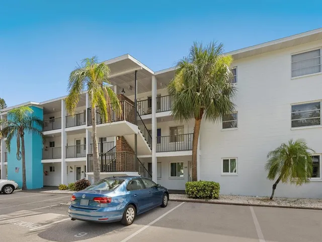 a car parked in front of a building