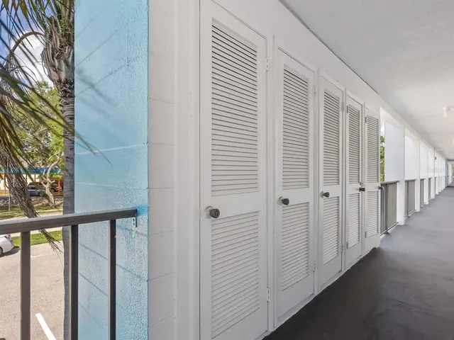 a view of a hallway with stairs