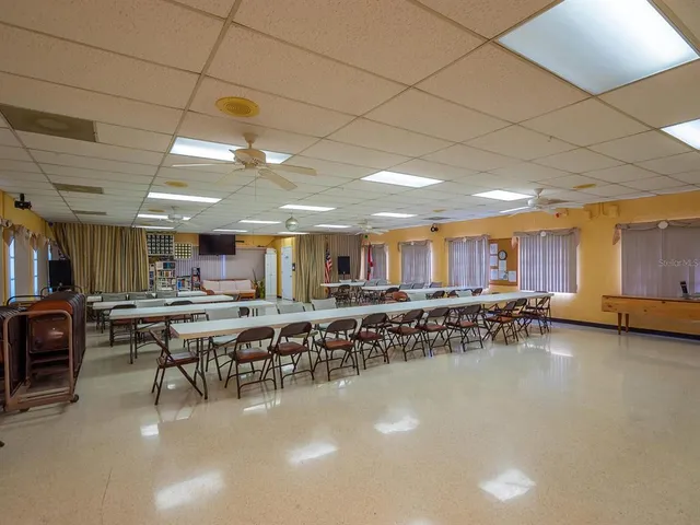 a view of a workspace with furniture