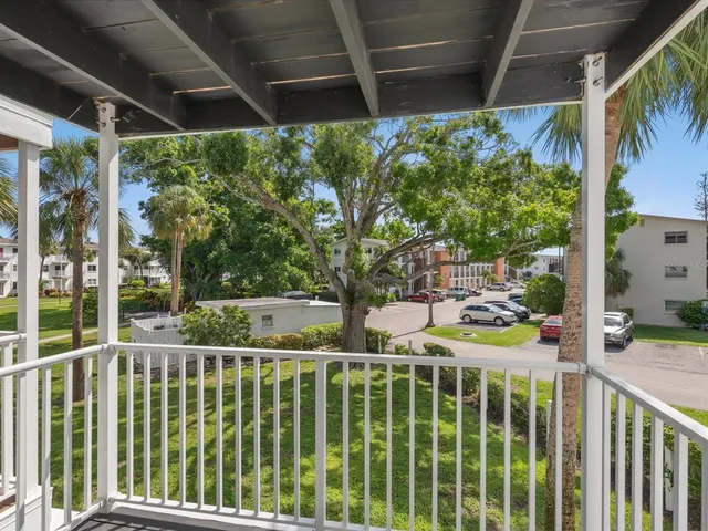 a view of a balcony with lake view