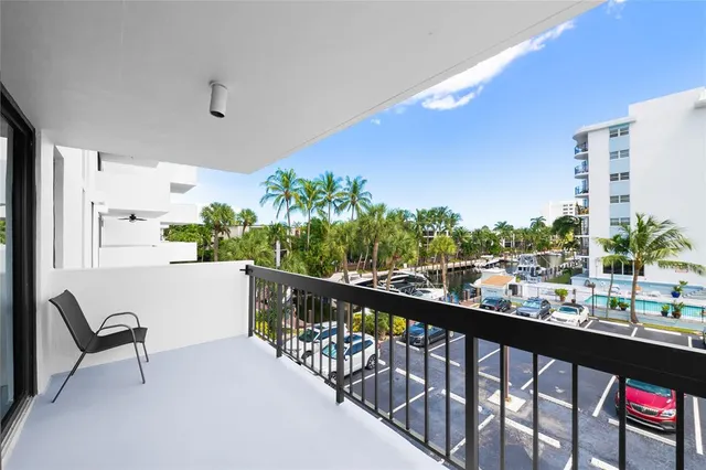 a view of a backyard with sitting area
