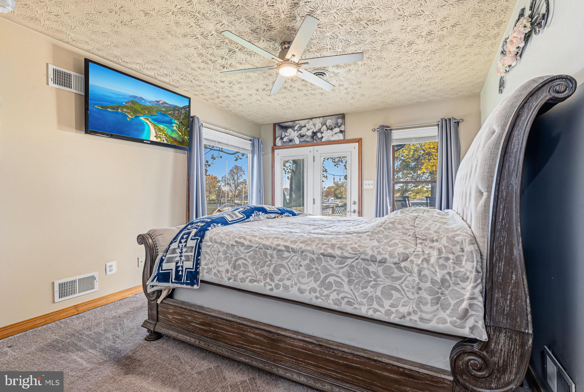 1907 Wills Road Baltimore, MD 21222 - Photo 13 of 42 a bedroom with a bed and a large window