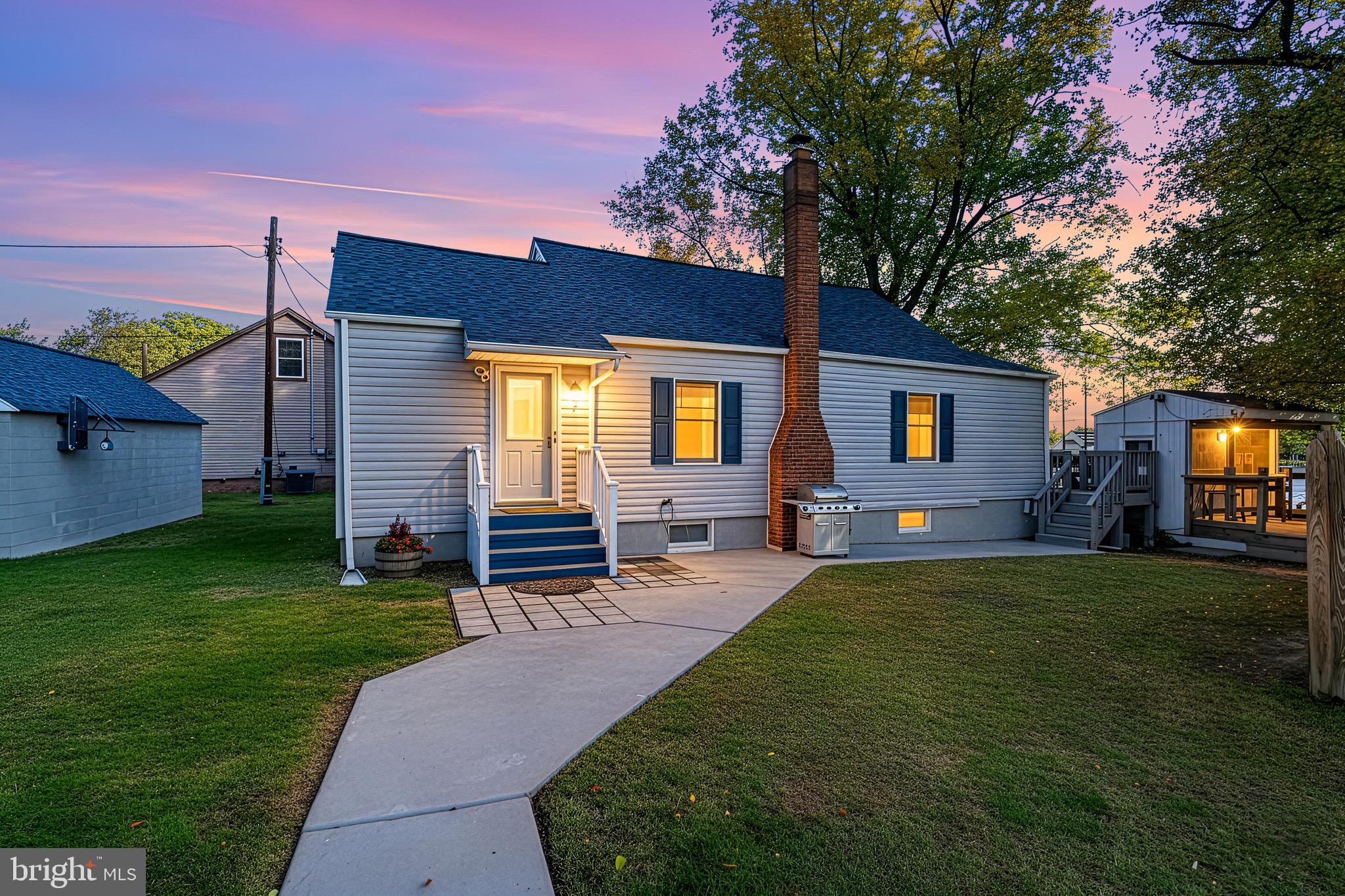 1907 Wills Road Baltimore, MD 21222 - Photo 2 of 42 a front view of house with yard and outdoor seating