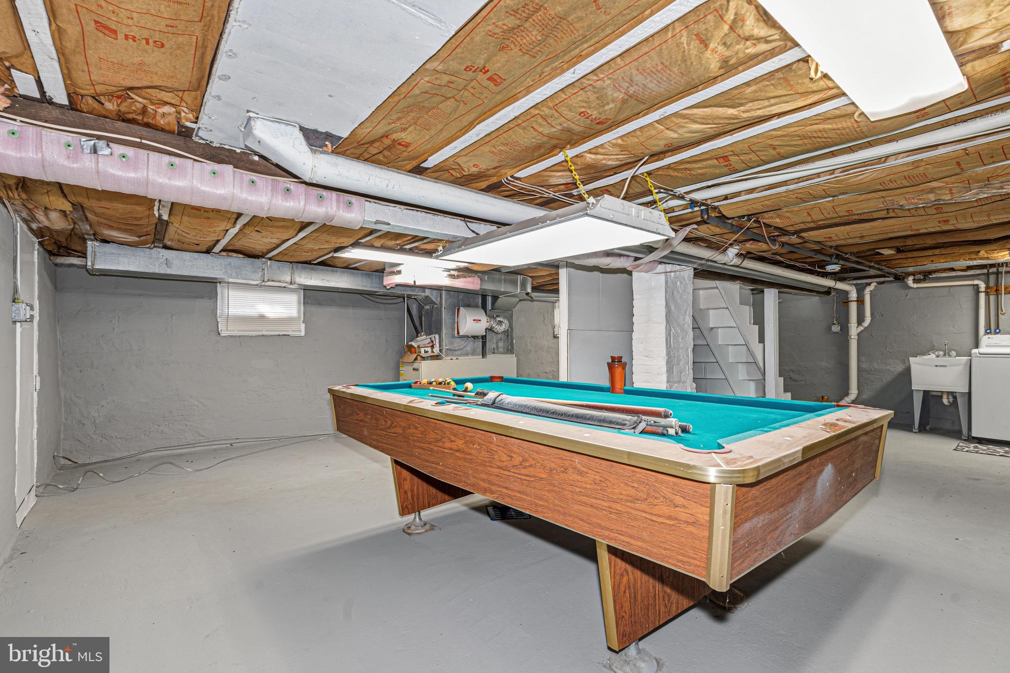 1907 Wills Road Baltimore, MD 21222 - Photo 38 of 42 a blue and white comforter in a room
