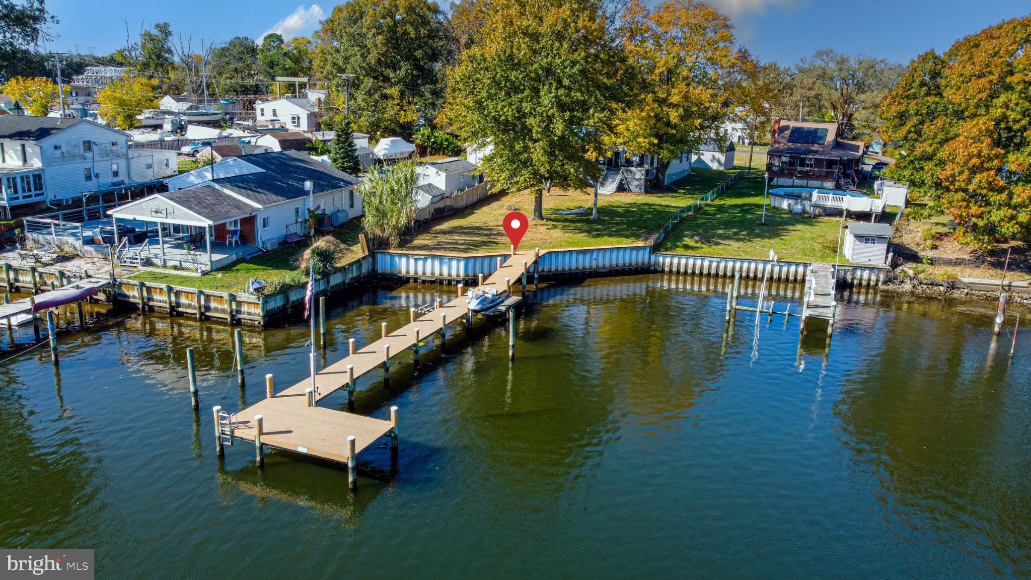 1907 Wills Road Baltimore, MD 21222 - Photo 6 of 42 a small pool with couple of trees in the background