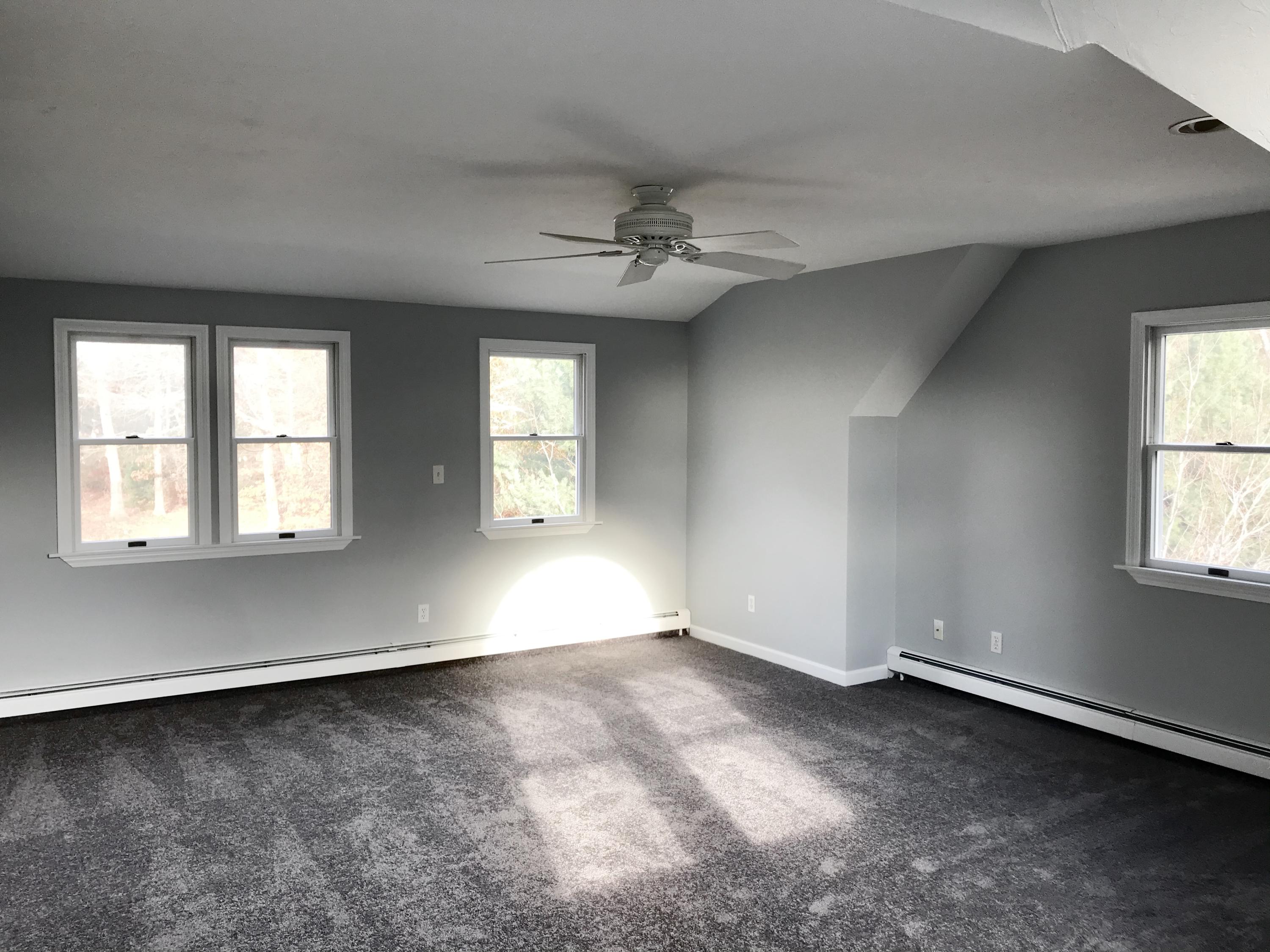 57 Deer Ridge Road Mashpee, MA 02649 - Photo 12 of 18 an empty room with a window